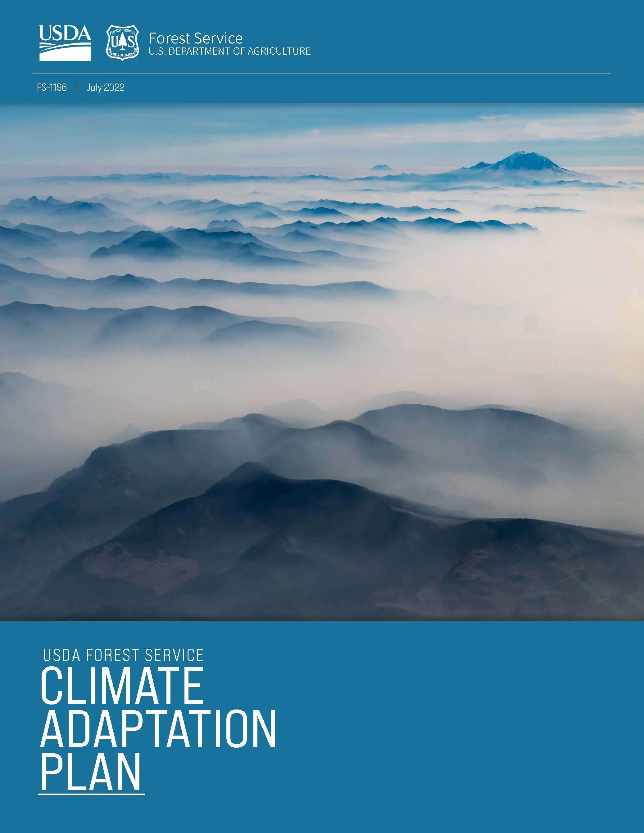 Cover page for the 2022 FS Action Plan for Climate Adaptation and Resilience, aerial view of cloud shrouded mountains.
