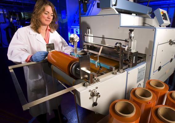 Tara McHugh casting carrot wrap into rolls at ARS’s Western Regional Research Center