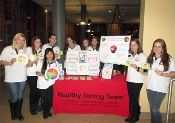 The RU Healthy Dining Team hosted a MyPlate nutrition education booth earlier this year. (Jenna Deinzer, Alexa Essenfeld, Nathalie Corres, Jesse Tannehill, Lindsay Yoakam, Rebecca Tonnessen, Taylor Palm, Mary Tursi, and Miranda Schlitt.)