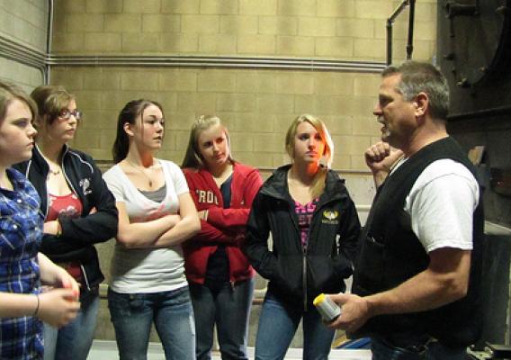 Darby High School students learn about the biomass system, part of a pilot program funded by a grant from the Forest Service’s National Fire Plan and aid from the Montana Department of Natural Resources and Conservation.