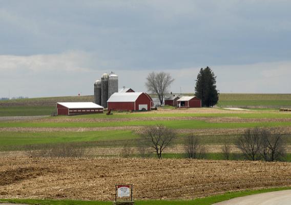 A family farm sits on small knoll in La Crosse, Wisconsin.