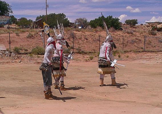 Members of the Apache Crown Dancers celebrate the opening of The Navajo Nation’s new chapter house/multi-purpose center.