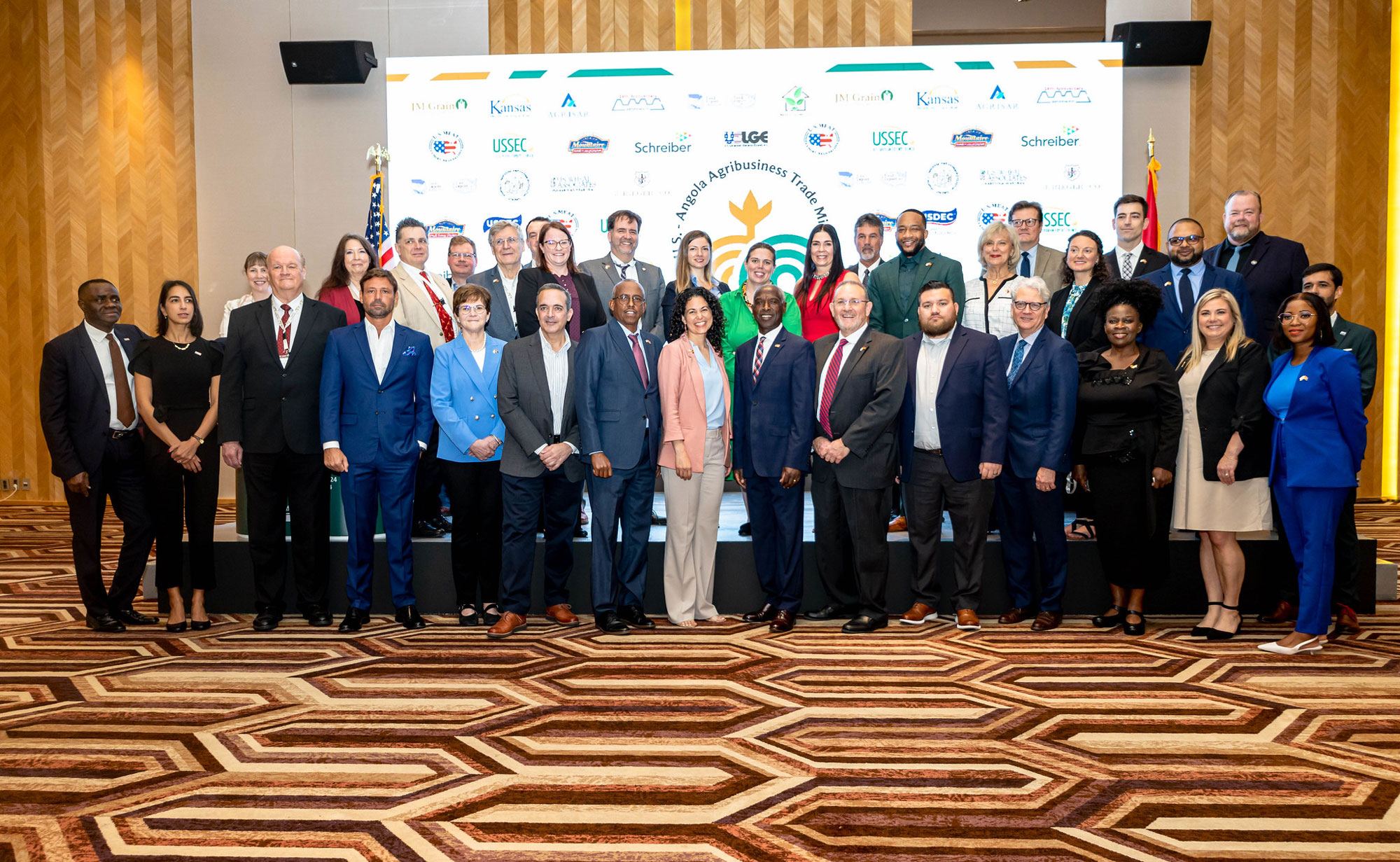 Deputy Secretary Torres Small is accompanied by U.S.-based State Departments of Agriculture, State and Regional Trade Groups, and Cooperators in a group shot