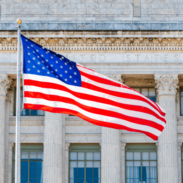 National flag of the USA, in front of the US Department of Agriculture in Washington D.C.