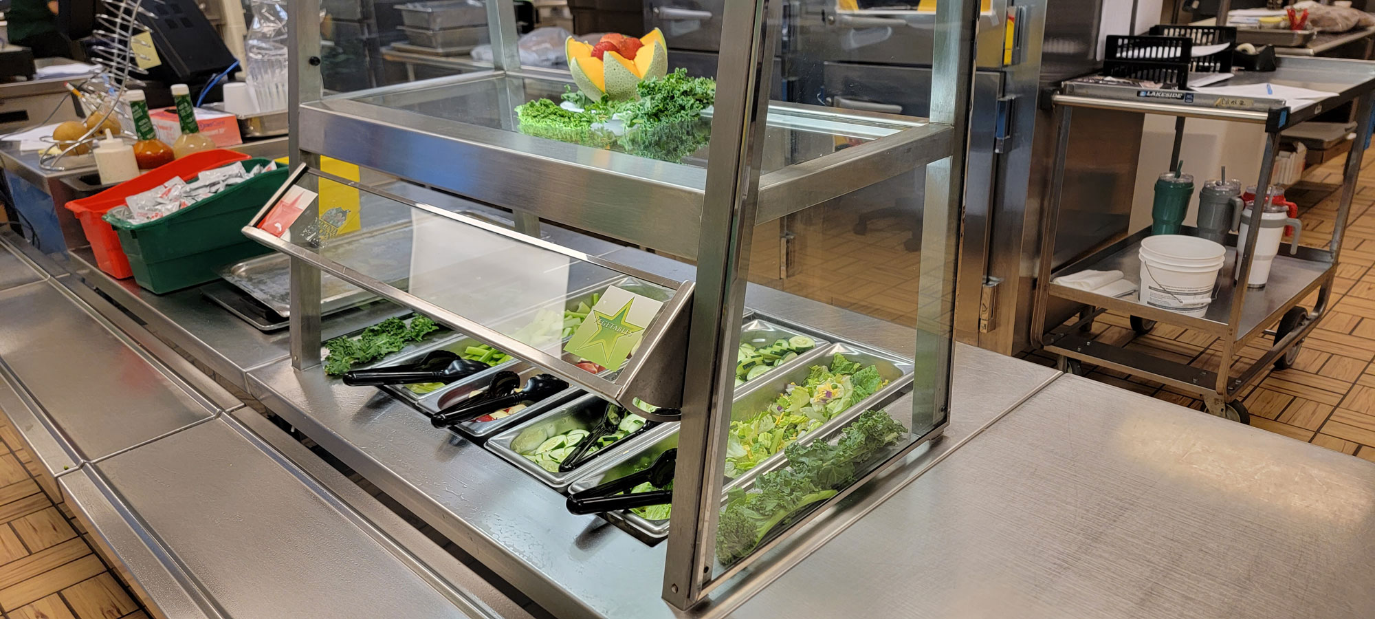 A school cafeteria salad bar features Virginia grown fruits and vegetables