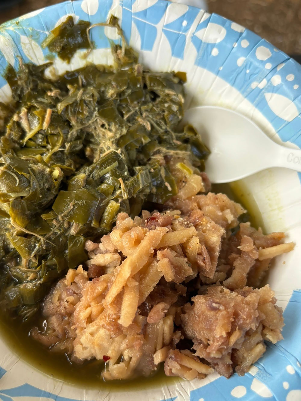 A plate of food: Lu’au stew and kalo hash