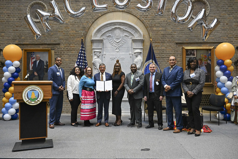 USDA staff and employees stand for a group photo with members of the Lumbee Tribe as well as guests from the University of North Carolina at Pembroke during the Unity Through Inclusion celebration on Tuesday, October 1, 2024, at the USDA Headquarters, Washington D.C.