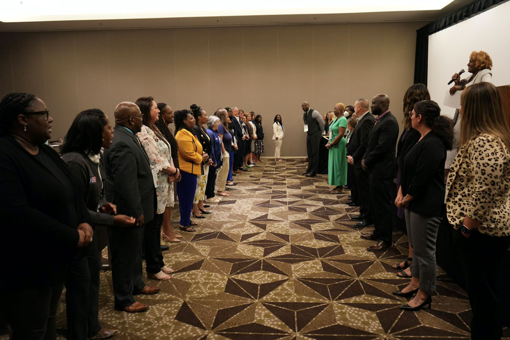 L'Tonya Davis, USDA Chief Diversity and Inclusion Officer, facilitates a dynamic exercise with attendees of the Veterans Benefits Administration (VBA) Training for Excellence Symposium in Austin, Texas on August 22, 2024