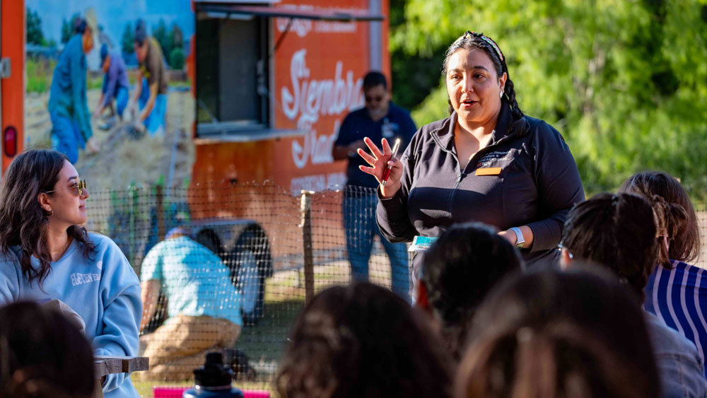 A woman speaking to a group