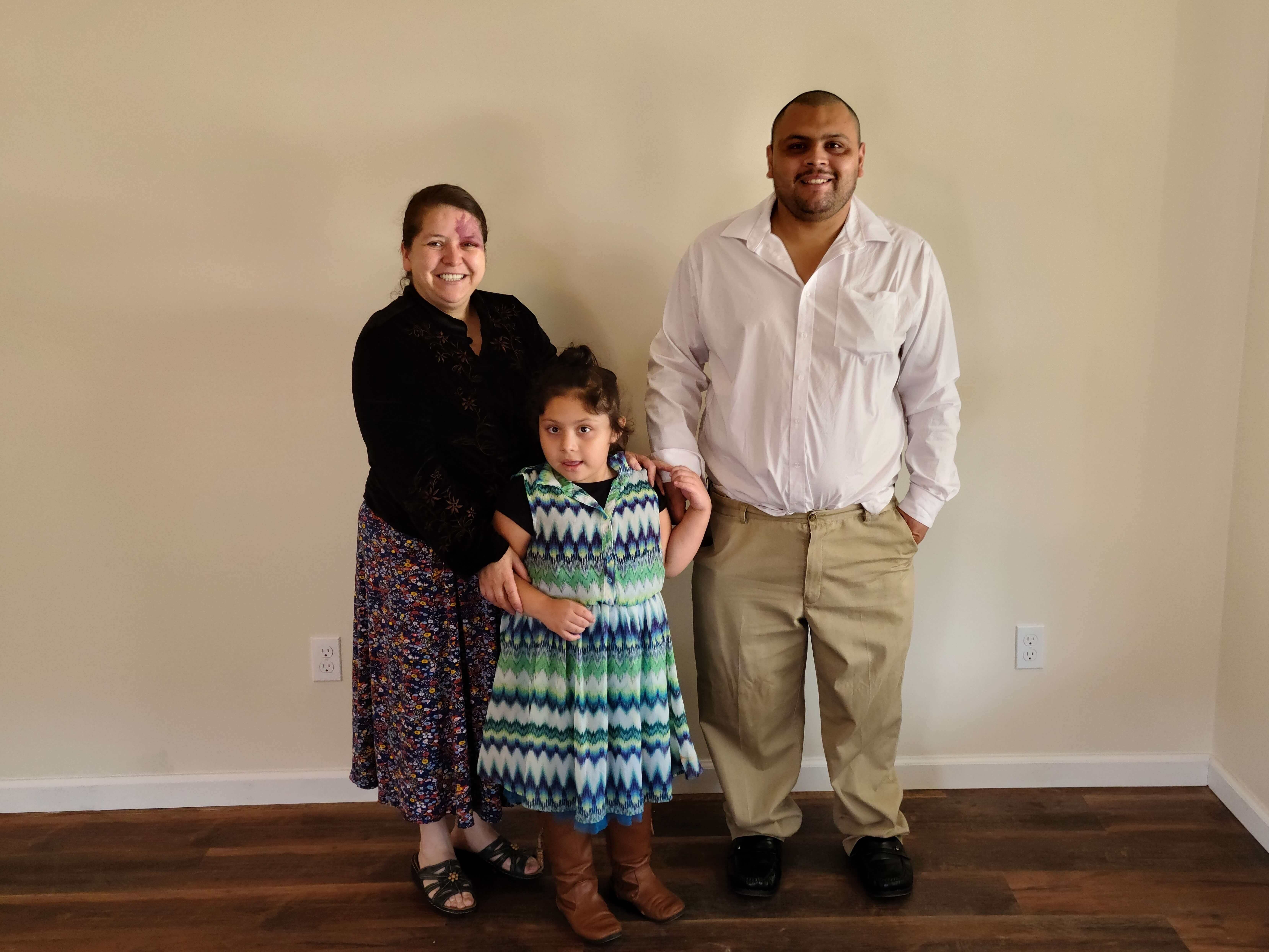 Gloria Gonzalez, Francisco Sanchez, and their daughter enjoy getting settled into their new home in Loudon County, Tennessee