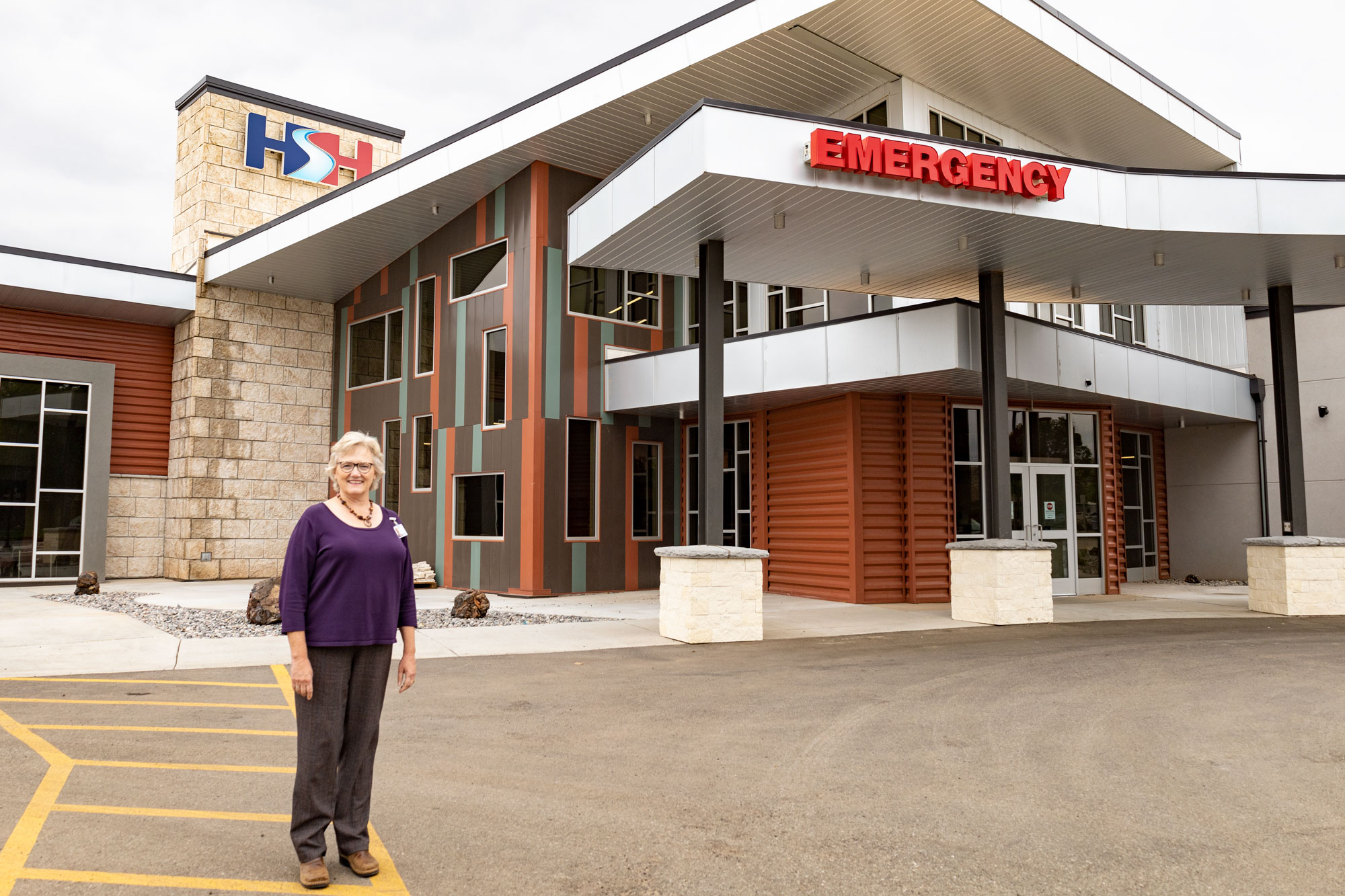 Hot Springs Health CEO Margie Molitor stands in front of the newly expanded and updated hospital in Thermopolis, Wyoming