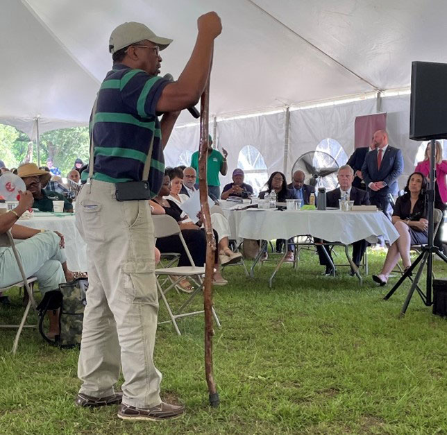 Third-generation local farmer asks a question during a Q&A session with USDA leaders