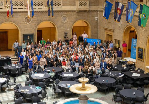 Group photo of the U.S. Digital Service in the Whitten Patio