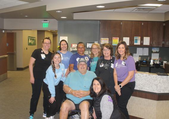 Family with hospital staff