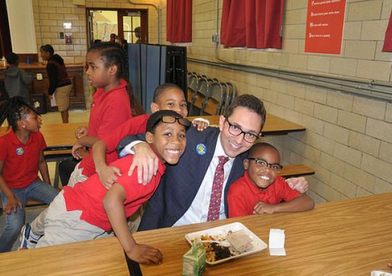 Acting Deputy Under Secretary for Food, Nutrition, and Consumer Services Brandon Lipps joining students for a healthy school meal