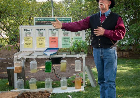 Oklahoma Conservation Commission Soil Scientist Greg Scott talks about the practical benefits of best soil management practices during NRCS’ soil health demonstration earlier this month. USDA Photo by Lance Cheung.