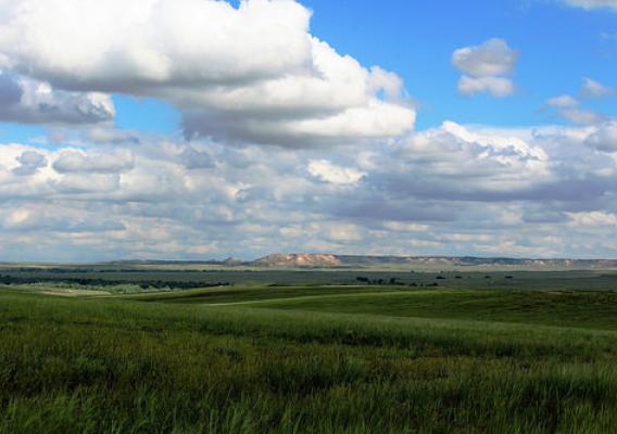 Summer clouds dance over the Miller Hills on the Thunder Basin National Grasslands