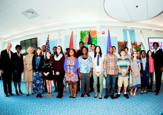 Concannon (far left) with students from Walt Whitman Middle School at Fort Belvoir Community Hospital, Va., Sept. 18, 2014.