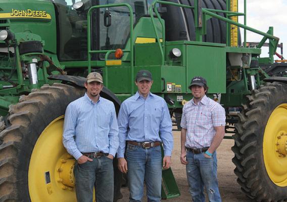 The Gruhlkey brothers – Brittan, 24, Braden 25, and Cameron 20 – worked with NRCS through the Ogallala Aquifer Initiative to adopt better equipment and techniques to manage their water use. USDA photo.