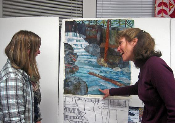 Karly Hedrick (l) and Fran Willis (r) admire a quilt in progress. Photo by Maret Pajutee, USFS. 